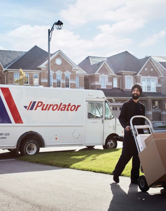 Purolator delivery van and delivery person